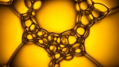 Yellow bubbles on a yellow-orange background.