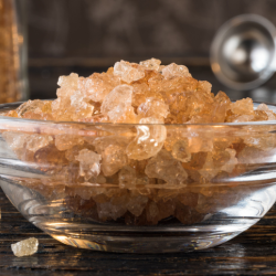 A small glass bowl filled with thickener crystals